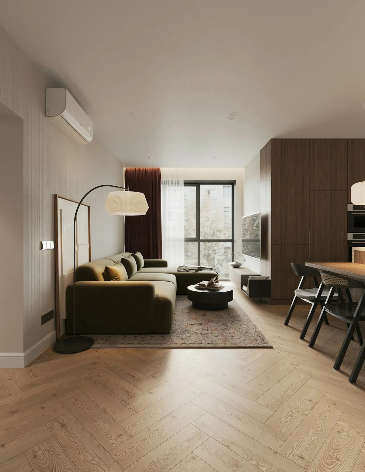 Apartment living and dining room with herringbone floor